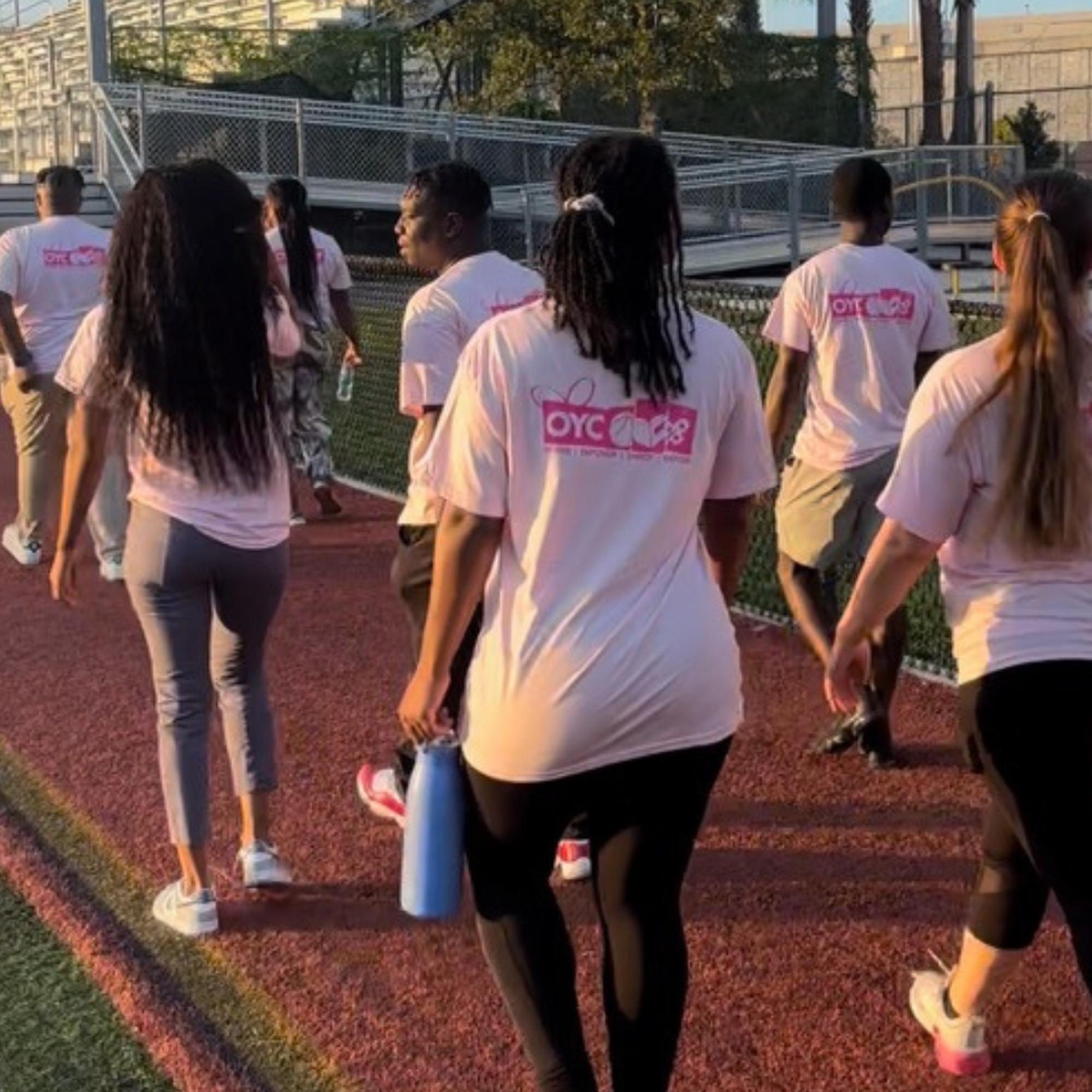 OYC Post High students participate in a walk to raise funding and awareness for breast cancer