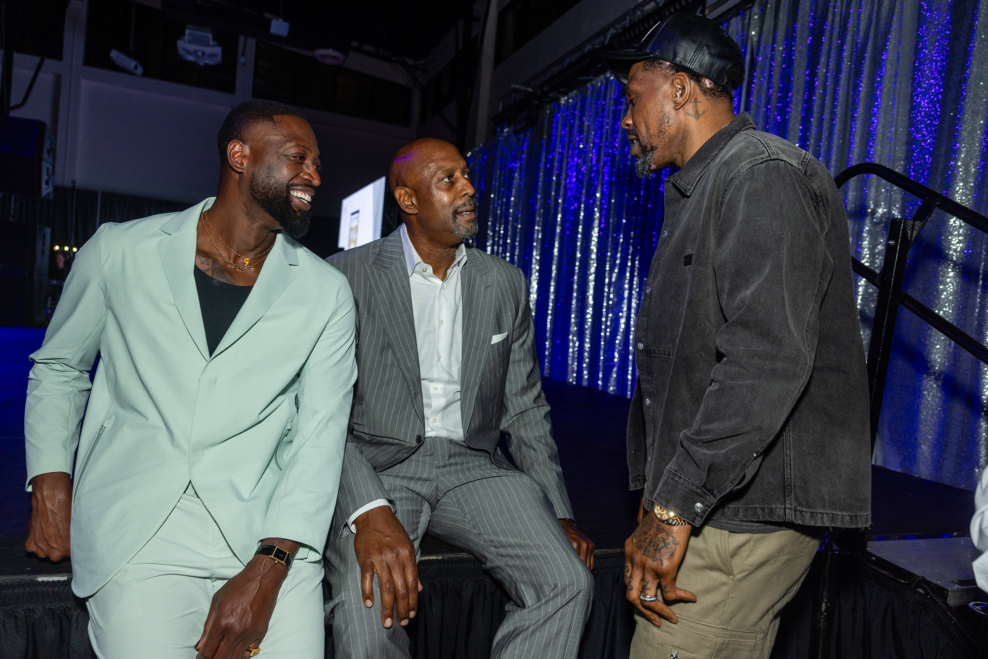 Dwayne Wads, Alonzo Mourning and Udonis Haslem hanging out at the OYC Grand Opening event