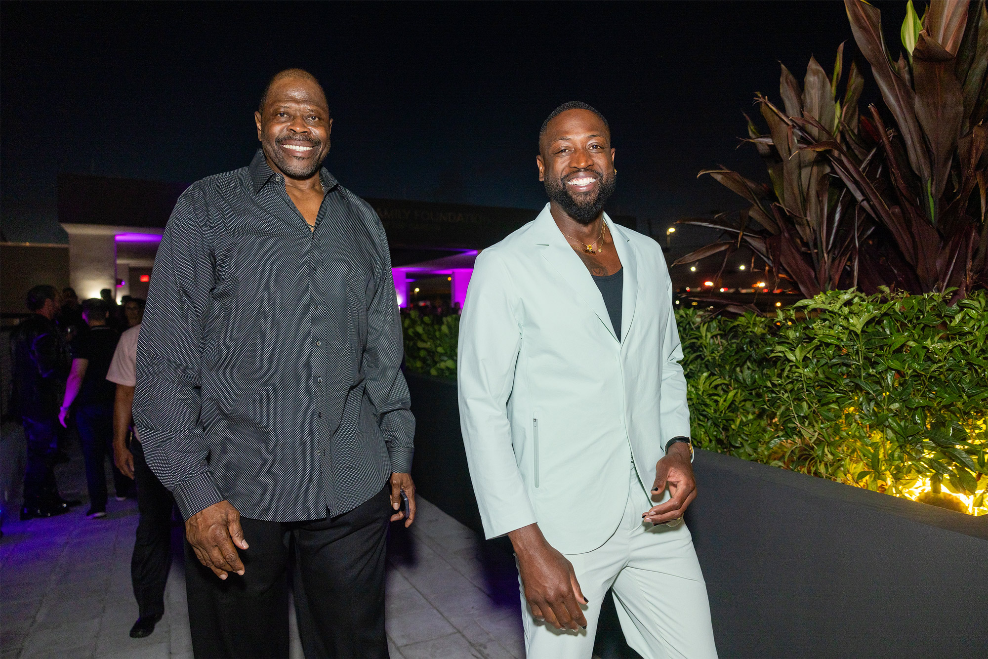 Patrick Ewing and Dwayne Wade outside the OYC miami building.